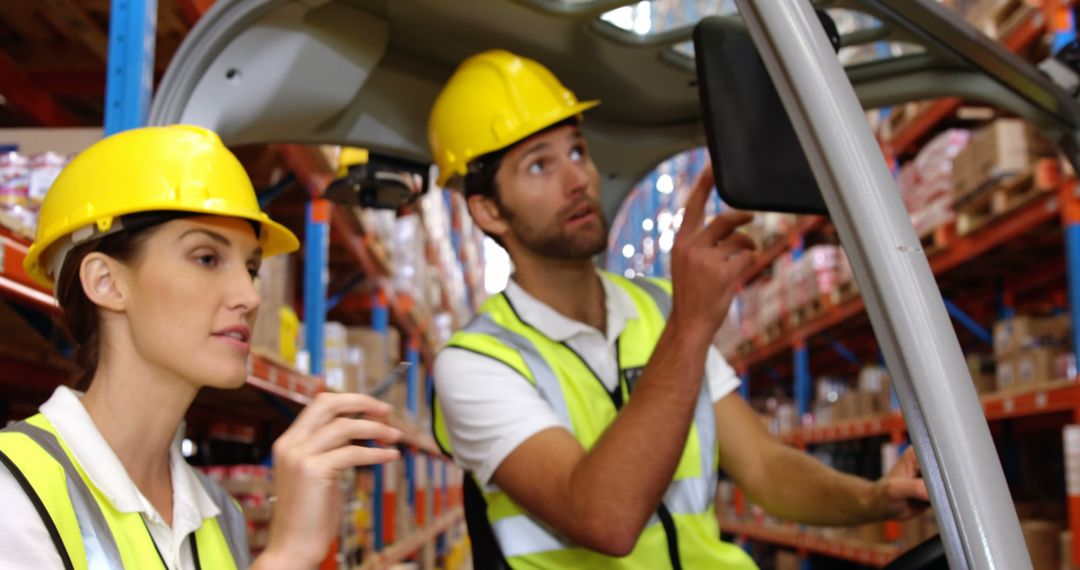 Warehouse Workers Using Forklift for Inventory Management - Free Images, Stock Photos and Pictures on Pikwizard.com