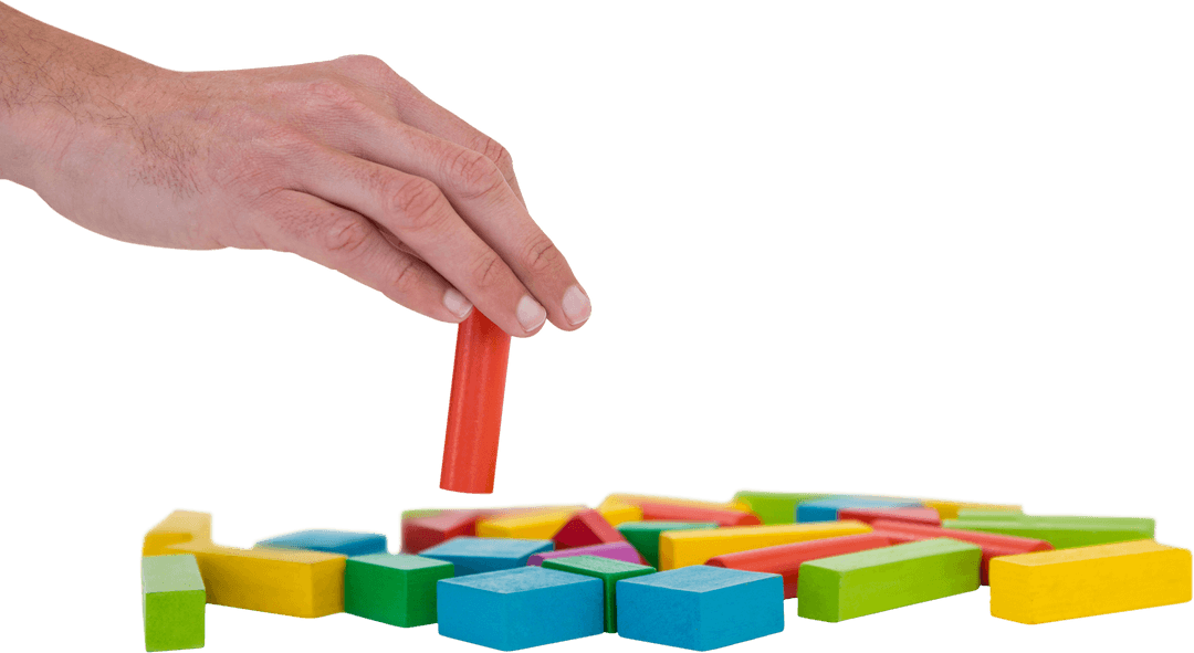 Transparent Hand Positioning Multicolored Building Blocks