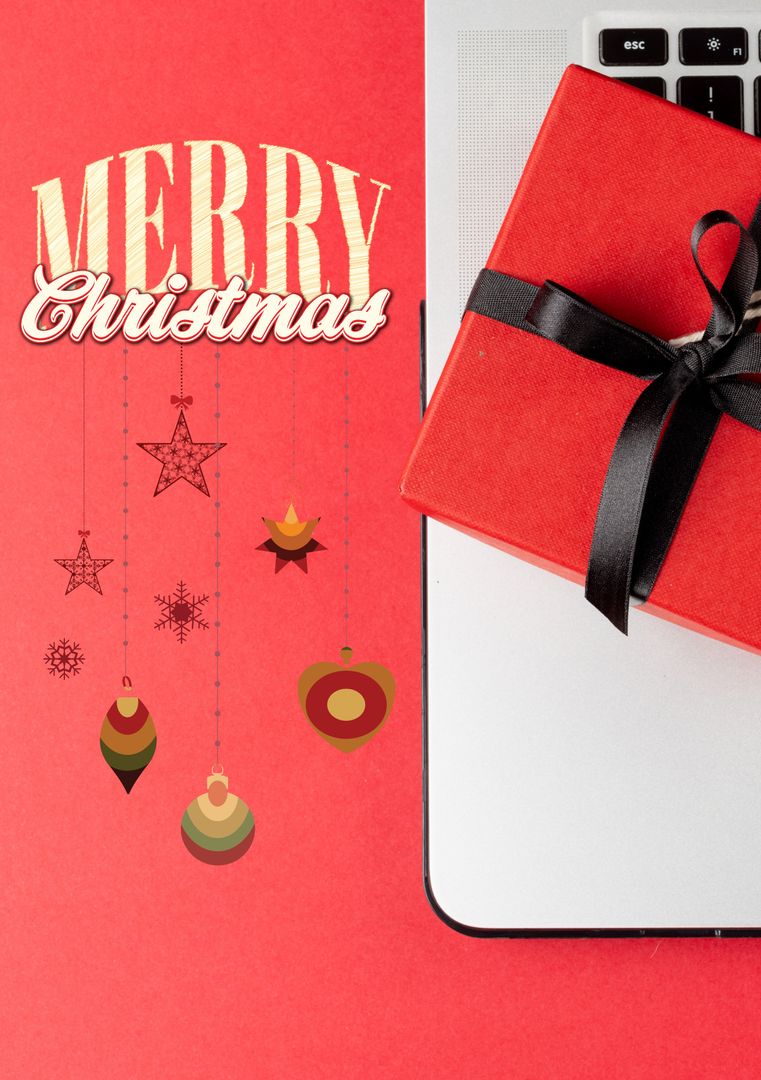 Merry Christmas Card with Decor and Gift on Laptop