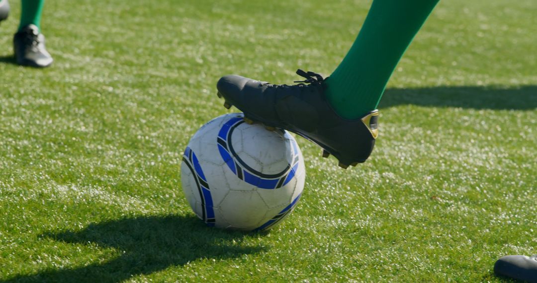 Soccer Player Preparing for Kickoff on Grass Field - Free Images, Stock Photos and Pictures on Pikwizard.com