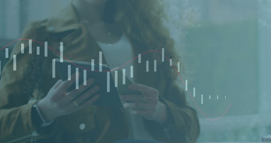 Woman Exploring Financial Data on Tablet with Graph Overlay