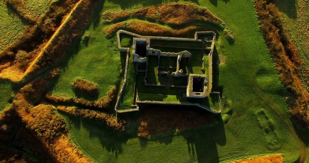 Aerial View of Ancient Ruins in Lush Green Landscape at Sunset - Free Images, Stock Photos and Pictures on Pikwizard.com