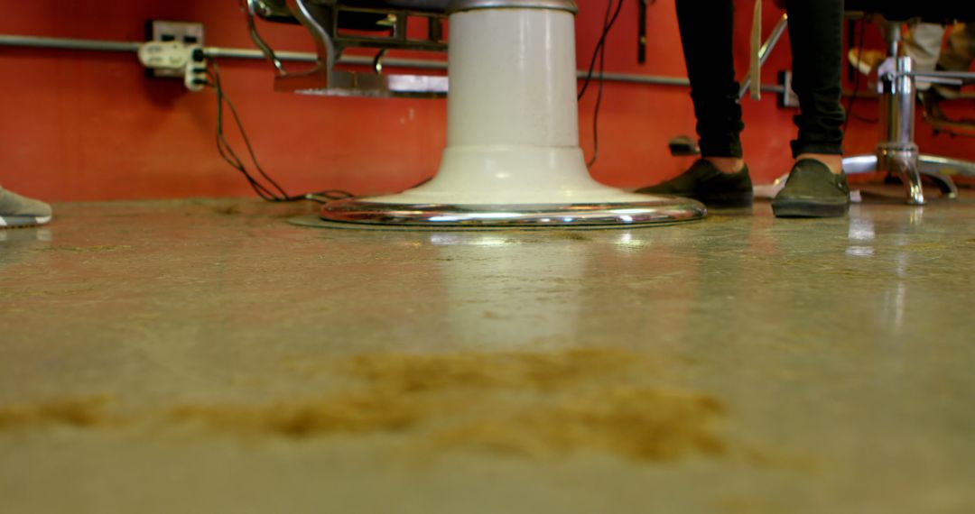 Hair Salon Floor with Hair Clippings and Barber Equipment - Free Images, Stock Photos and Pictures on Pikwizard.com