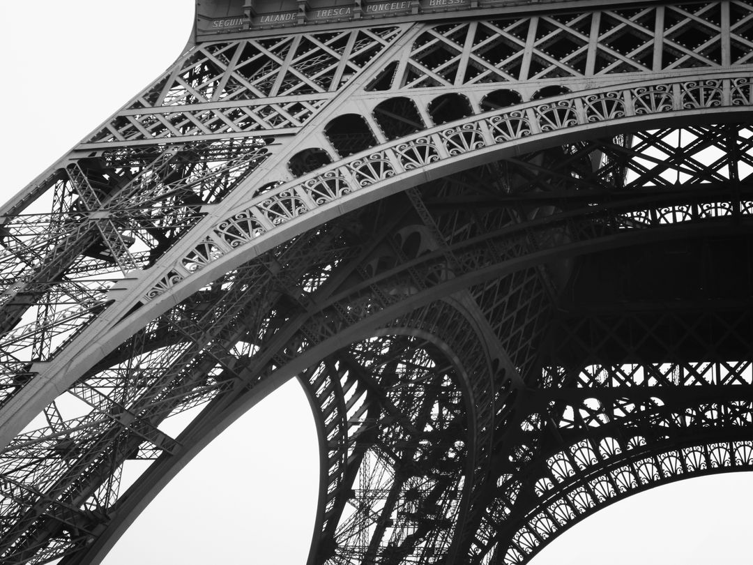 Close-Up View of Eiffel Tower Iron Structure in Black and White - Free Images, Stock Photos and Pictures on Pikwizard.com