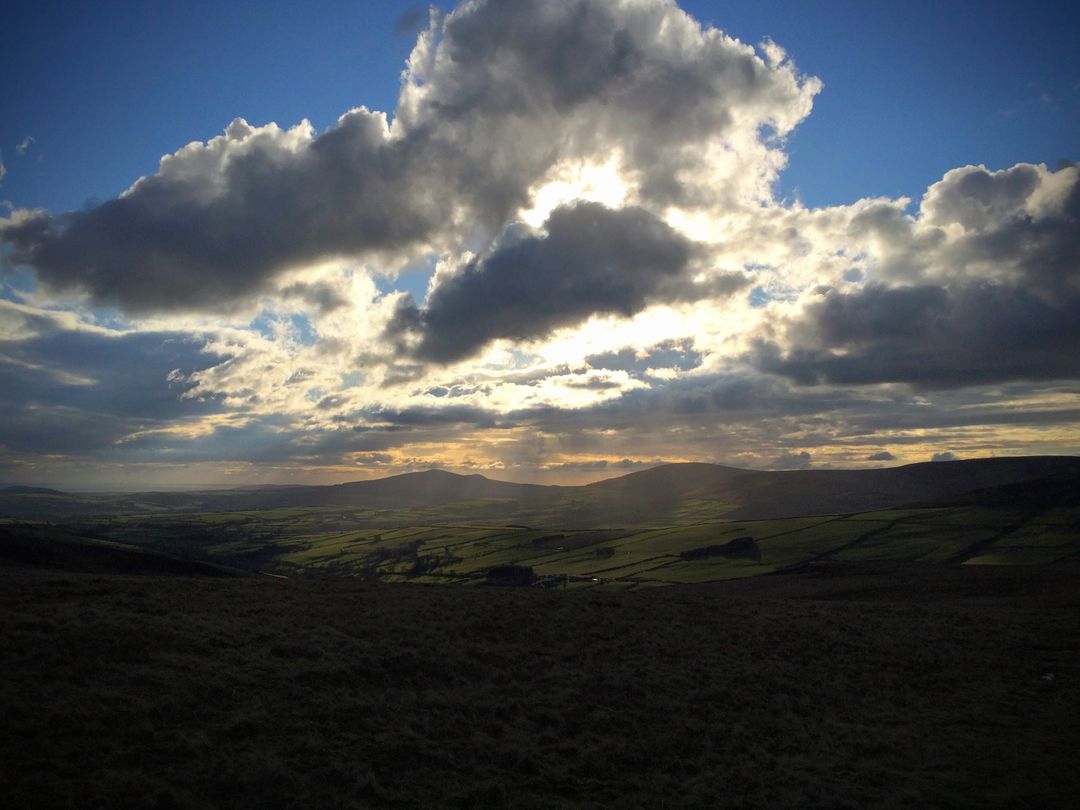 Scenic Landscape with Dramatic Clouds and Sunlight - Free Images, Stock Photos and Pictures on Pikwizard.com