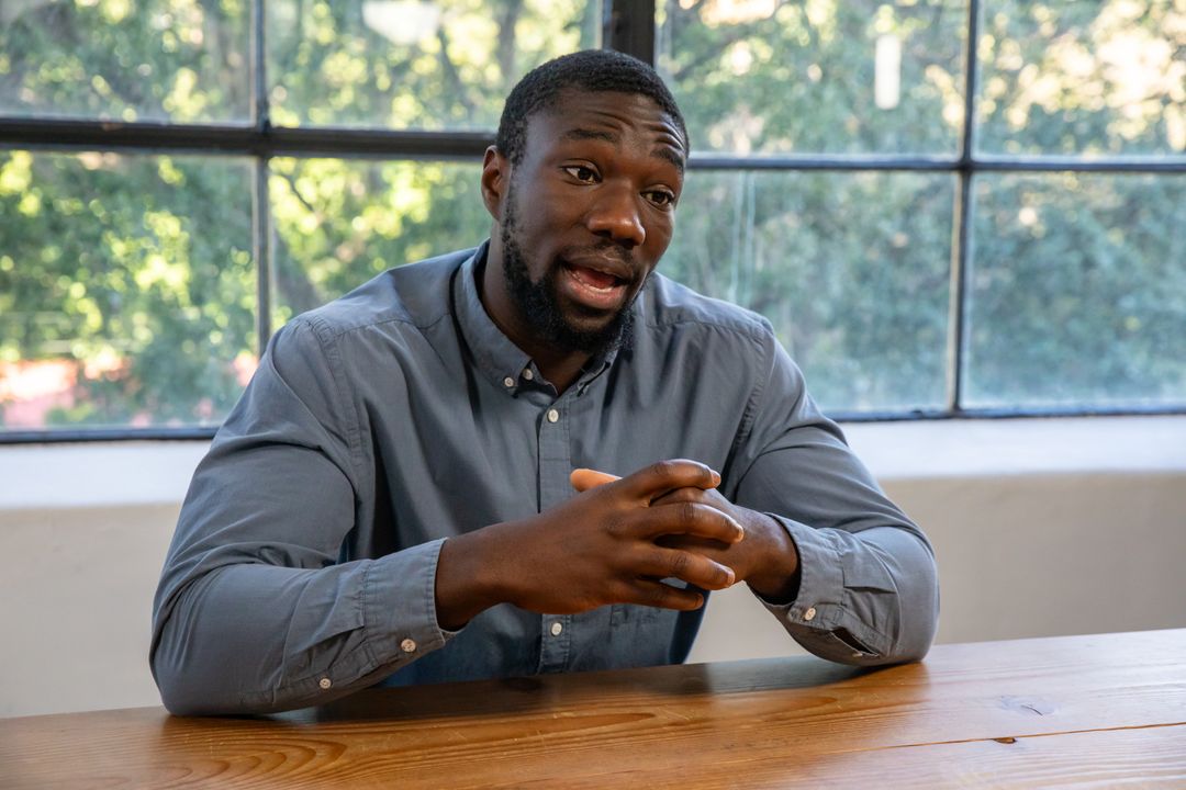 Confident Professional Collaborating in Modern Office