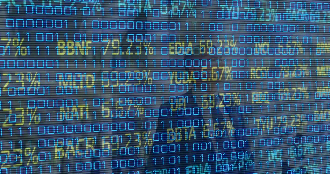 Businesspeople Overlaid with Financial Data and Binary Code