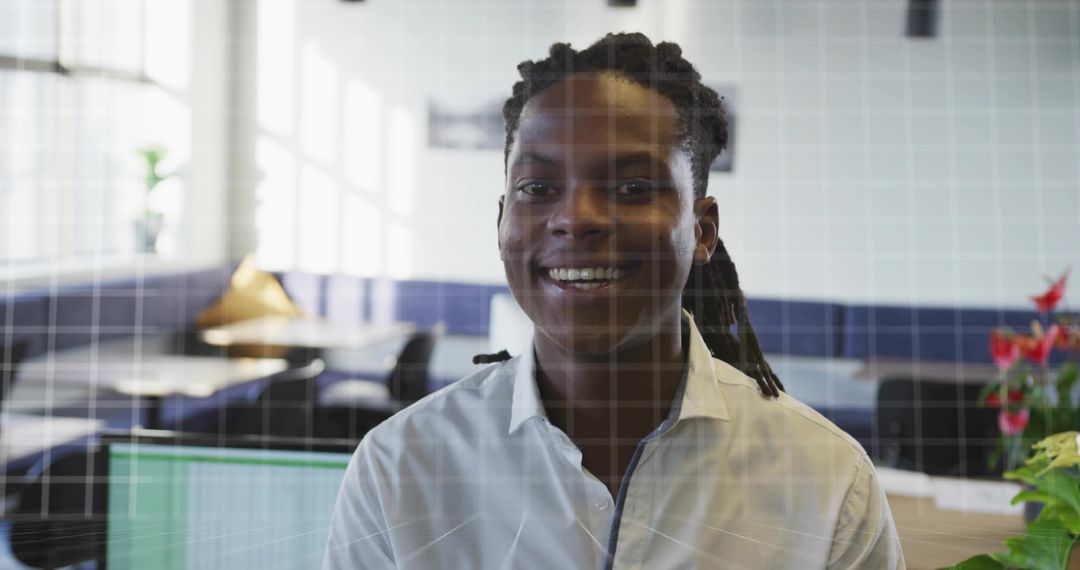 Smiling Professional Working in Modern Office Environment