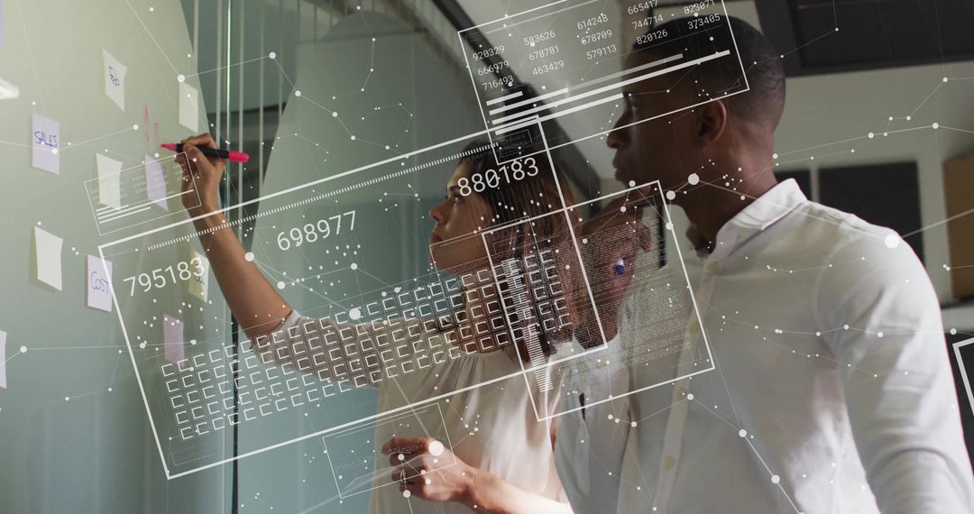 Young Professionals Collaborating on Digital Transformation with Data