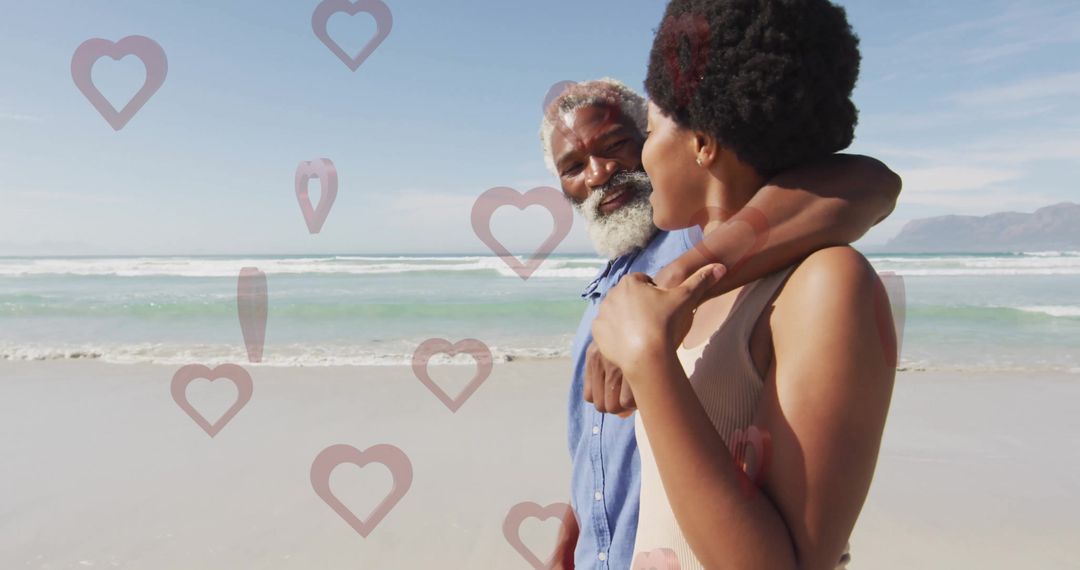 Affectionate Couple Embracing by Beach with Heart Overlays