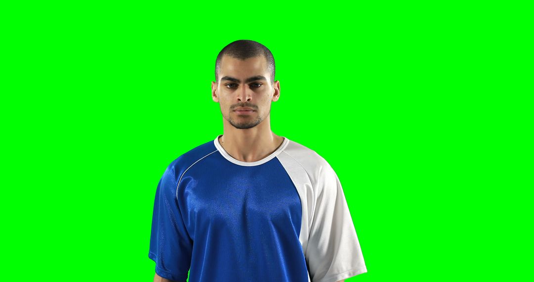 Serious Athlete in Blue and White Jersey on Isolated Green Screen - Free Images, Stock Photos and Pictures on Pikwizard.com