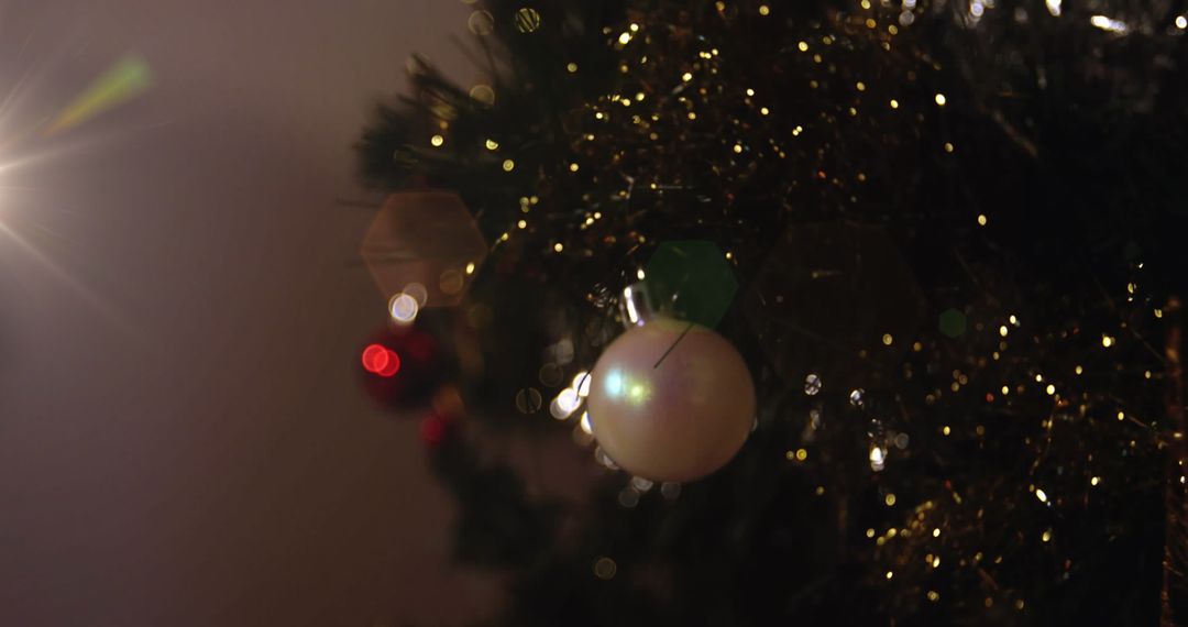 Close-up of Christmas Tree with Baubles and Bokeh Lights