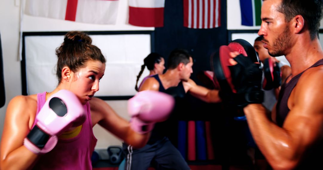 Group Boxing Training with Coach in Gym - Free Images, Stock Photos and Pictures on Pikwizard.com