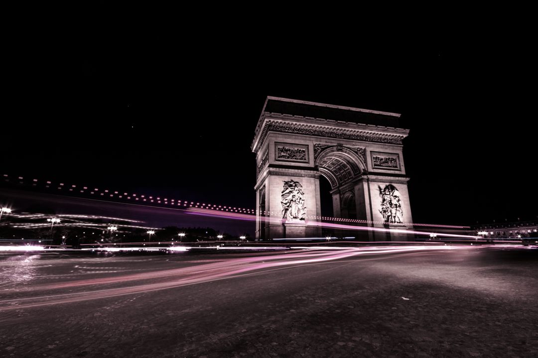 Night Urban Scene with Arc de Triomphe and Light Trails - Free Images, Stock Photos and Pictures on Pikwizard.com