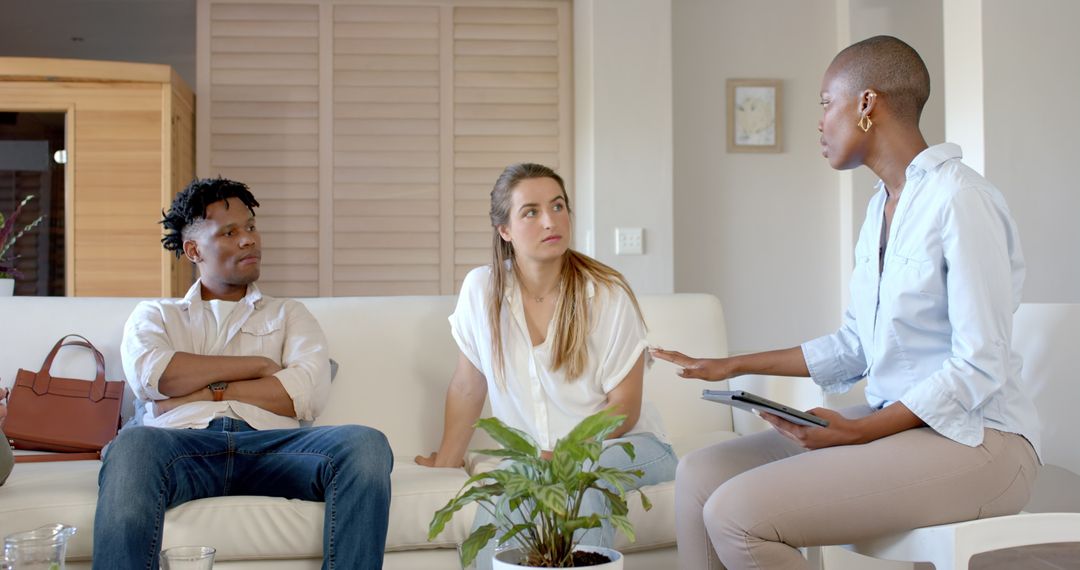 Diverse Group Engaged in Connected Discussion at Home Environment