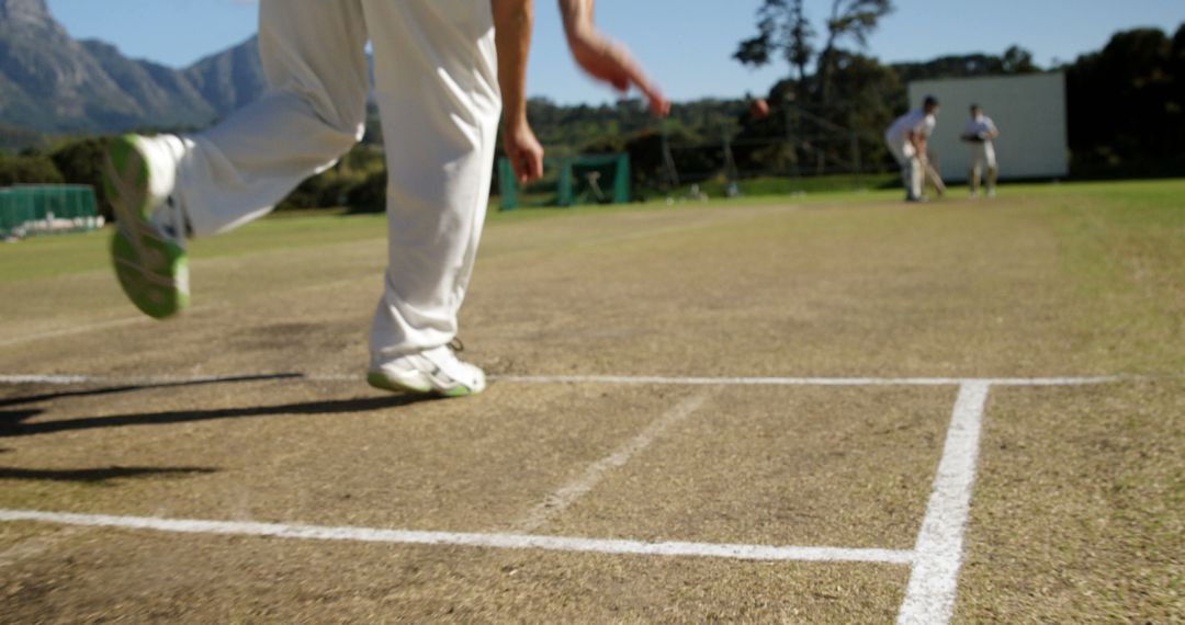 Cricket Bowler Releasing Ball on Pitch during Match - Free Images, Stock Photos and Pictures on Pikwizard.com