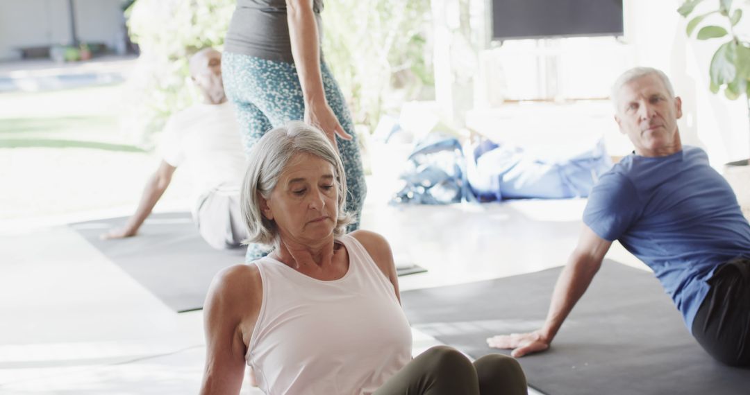 Group of Seniors Doing Stretching Exercise Indoors - Free Images, Stock Photos and Pictures on Pikwizard.com