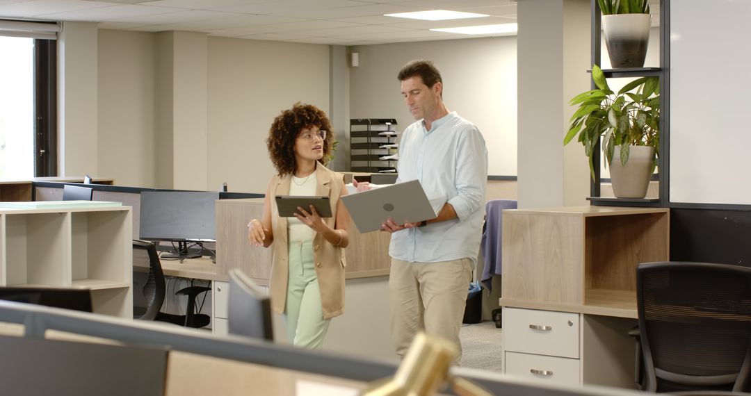 Diverse Teams Collaborating in Modern Office Environment