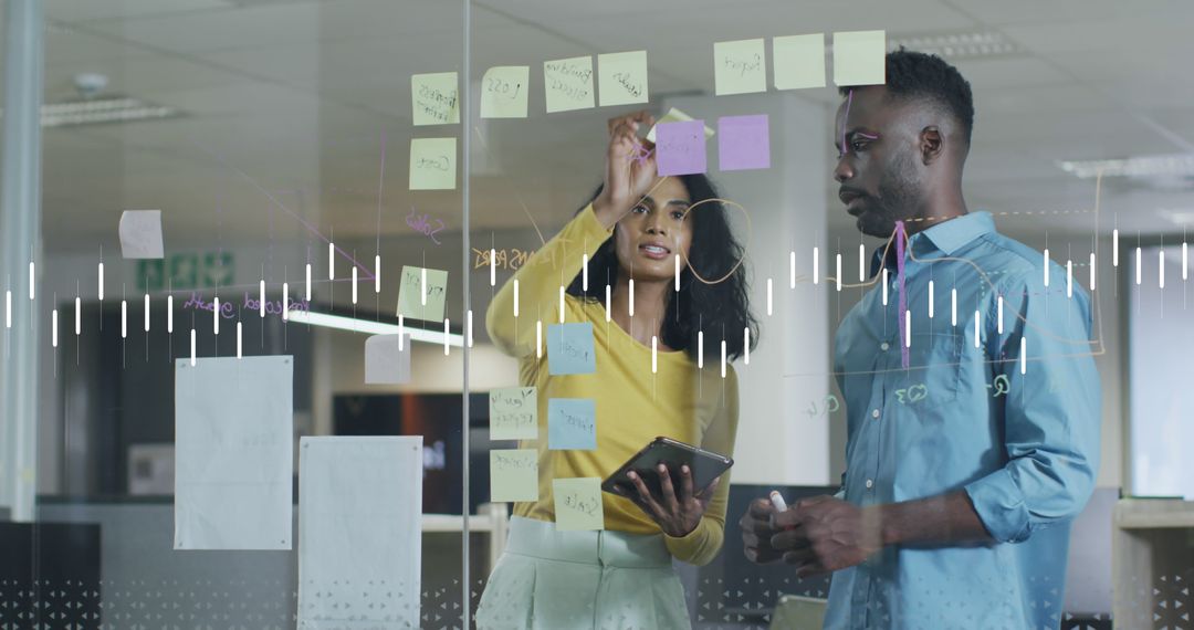 Colleagues Discussing and Brainstorming Over Project in Office