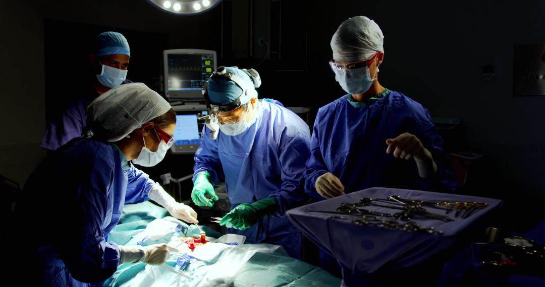 Team of Surgeons Performing Surgery Under Intense Lighting - Free Images, Stock Photos and Pictures on Pikwizard.com