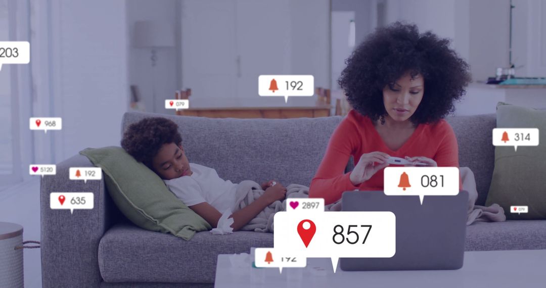 Multitasking Mother with Laptop and Smartphone at Home