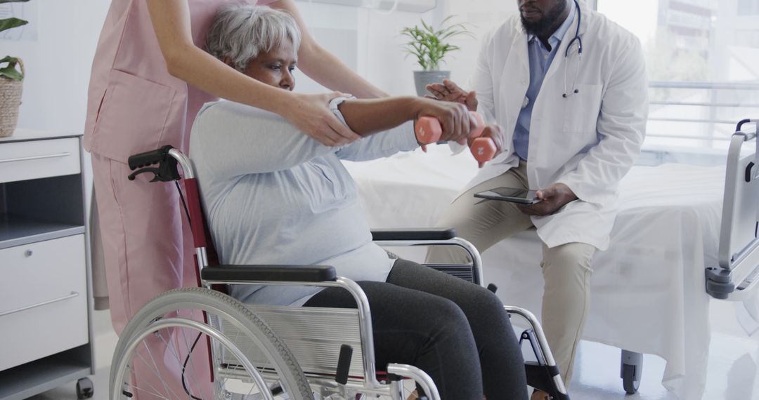 Healthcare Professionals Guiding Elderly Patient in Strength Training - Free Images, Stock Photos and Pictures on Pikwizard.com