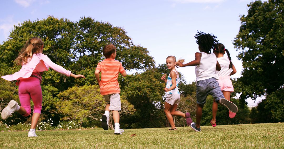 Group of Children Playing Outdoors on Sunny Day - Free Images, Stock Photos and Pictures on Pikwizard.com