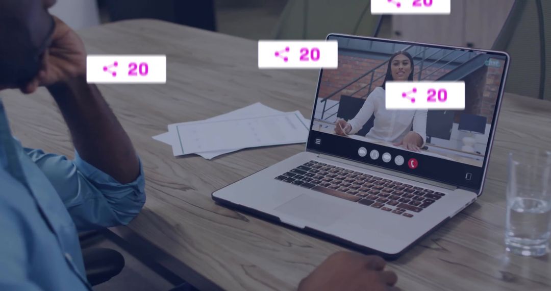 Virtual Meeting Engagement Annotated with Share Icons on Laptop Screen