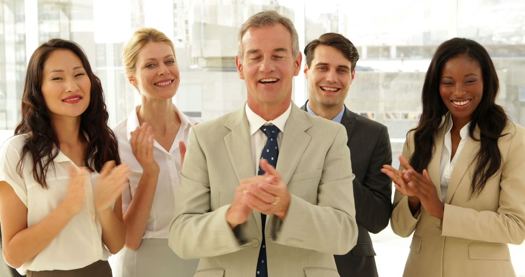 Happy Employees Team in Formal Attire Applauding - Free Images, Stock Photos and Pictures on Pikwizard.com