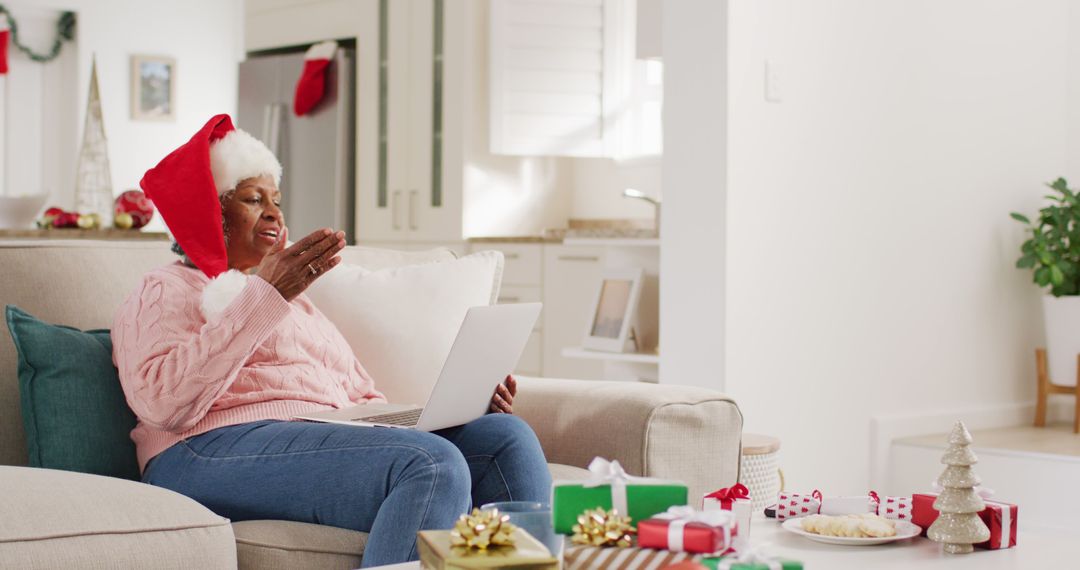 Elderly Woman Having Holiday Video Call On Laptop At Home - Free Images, Stock Photos and Pictures on Pikwizard.com