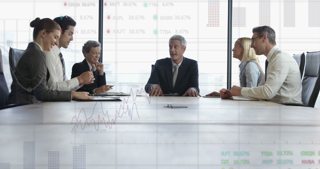 Business Team Analyzing Financial Data in Modern Conference Room - Free Images, Stock Photos and Pictures on Pikwizard.com