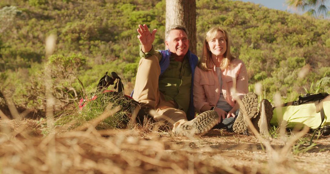 Senior Couple Enjoying Nature on a Mountain Hike - Free Images, Stock Photos and Pictures on Pikwizard.com