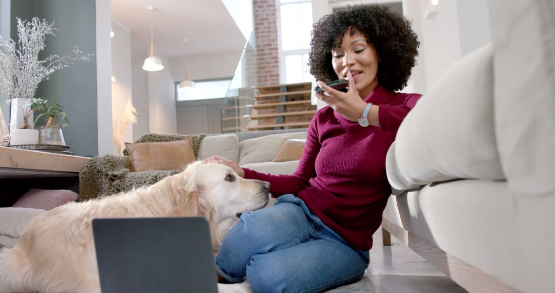 Woman Working Remotely While Interacting with Pet Dog - Free Images, Stock Photos and Pictures on Pikwizard.com