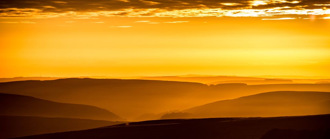 Golden Sunrise Over Serene Rolling Hills - Free Images, Stock Photos and Pictures on Pikwizard.com