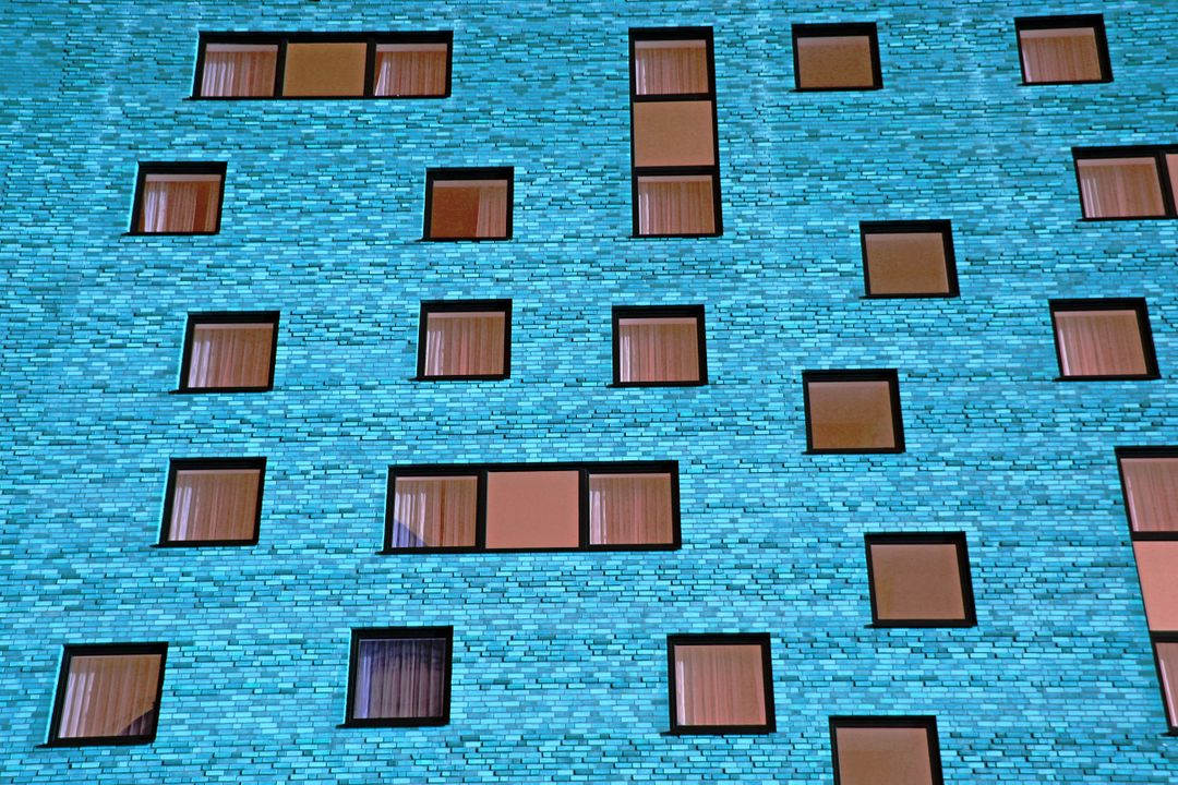 Abstract Modern Building Facade with Asymmetrical Windows - Free Images, Stock Photos and Pictures on Pikwizard.com