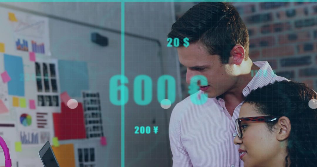 Collaborating over digital dashboards with teal data overlay showing financial metrics