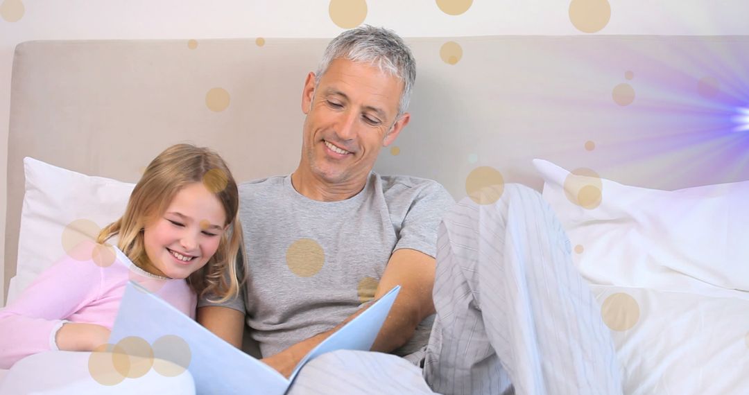Father and Daughter Bonding Reading Together with Magic Glowing Lights