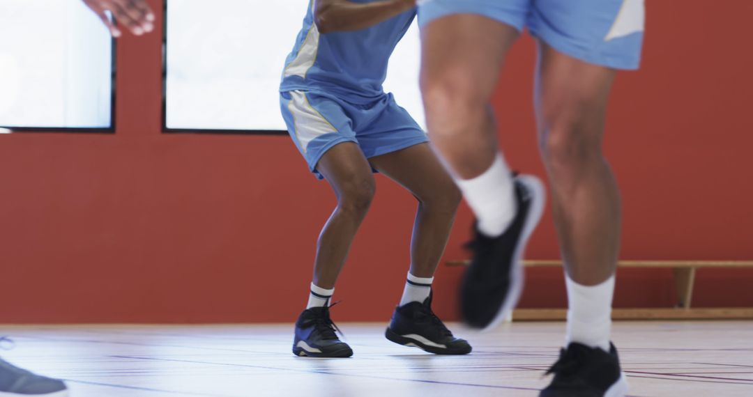 Male Basketball Players Practicing Drills in Indoor Gym - Free Images, Stock Photos and Pictures on Pikwizard.com