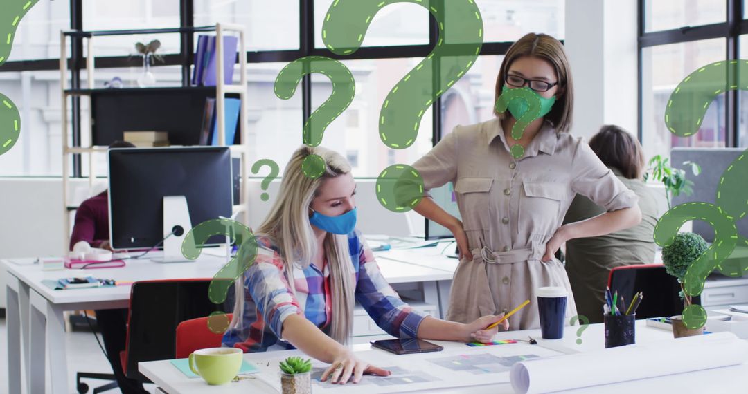 Diverse Businesswomen Collaborating in Office with Masks and Digital Overlays