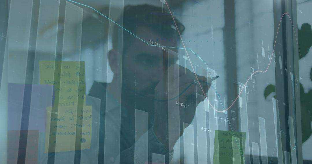 Businessman Analyzing Financial Data on Innovative Digital Interface