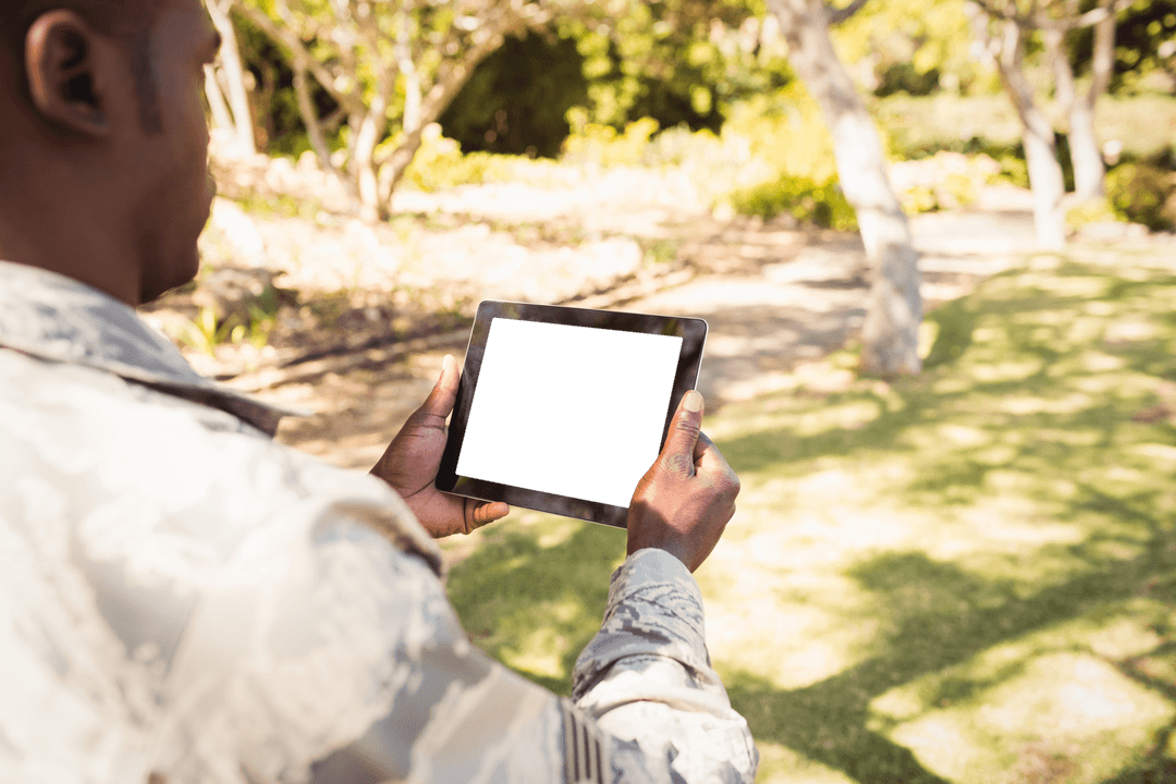 Man Holding Transparent Screen Tablet Outdoor Concept