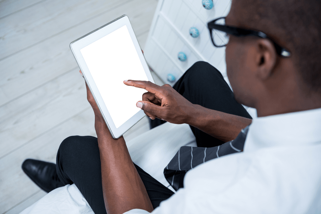 Businessman using tablet with transparent screen technology