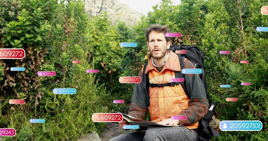 Hiker Planning Journey with Map in Lush Mountain Terrain