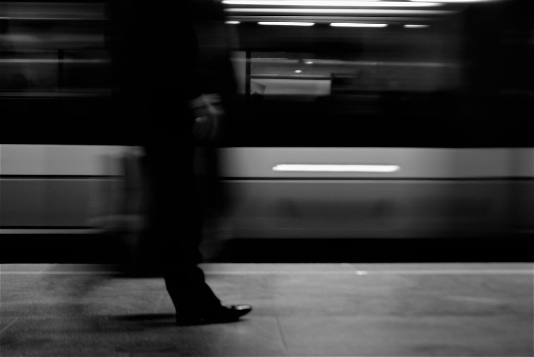 Blurred Motion of Commuter Walking in Subway Station - Free Images, Stock Photos and Pictures on Pikwizard.com