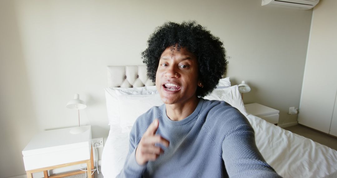 Middle-Aged African American Man Engaging in Video Call at Home