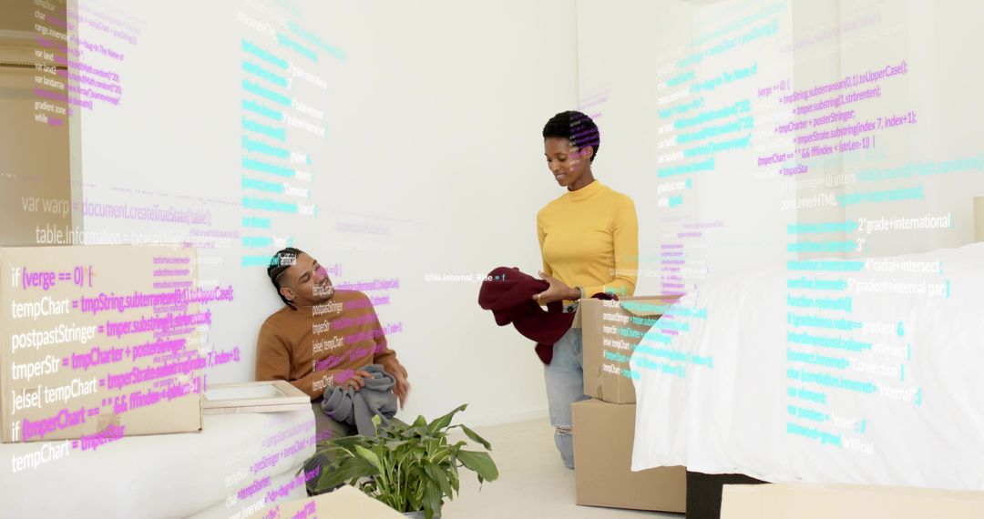 Couple unpacking and sorting clothes in cozy bedroom with projected code and moving boxes