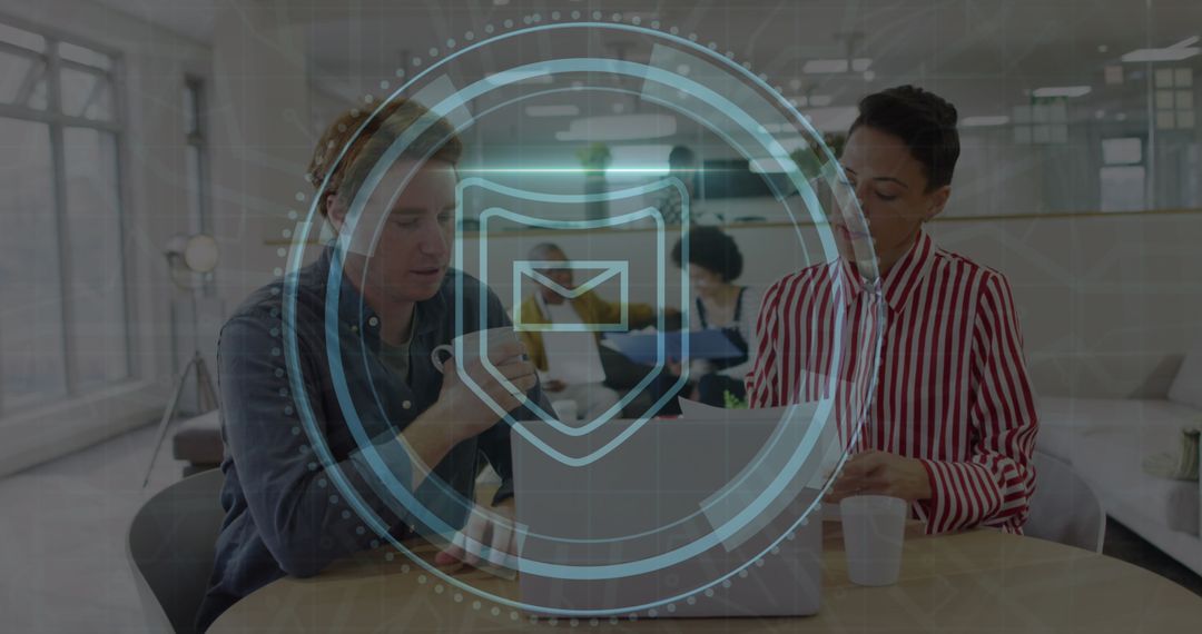 Business Professionals Discussing Cybersecurity Strategies in Office