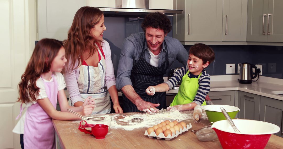 Close-knit Family Enjoys Baking Together in Modern Kitchen - Free Images, Stock Photos and Pictures on Pikwizard.com