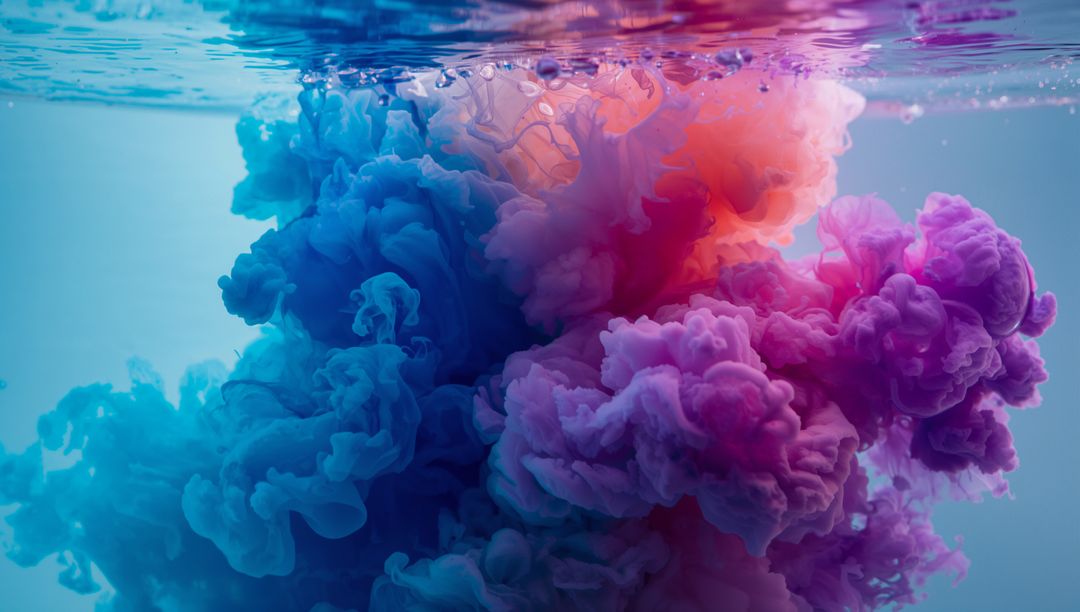 Vibrant Ink Swirl Creating Lush Underwater Fluid Art