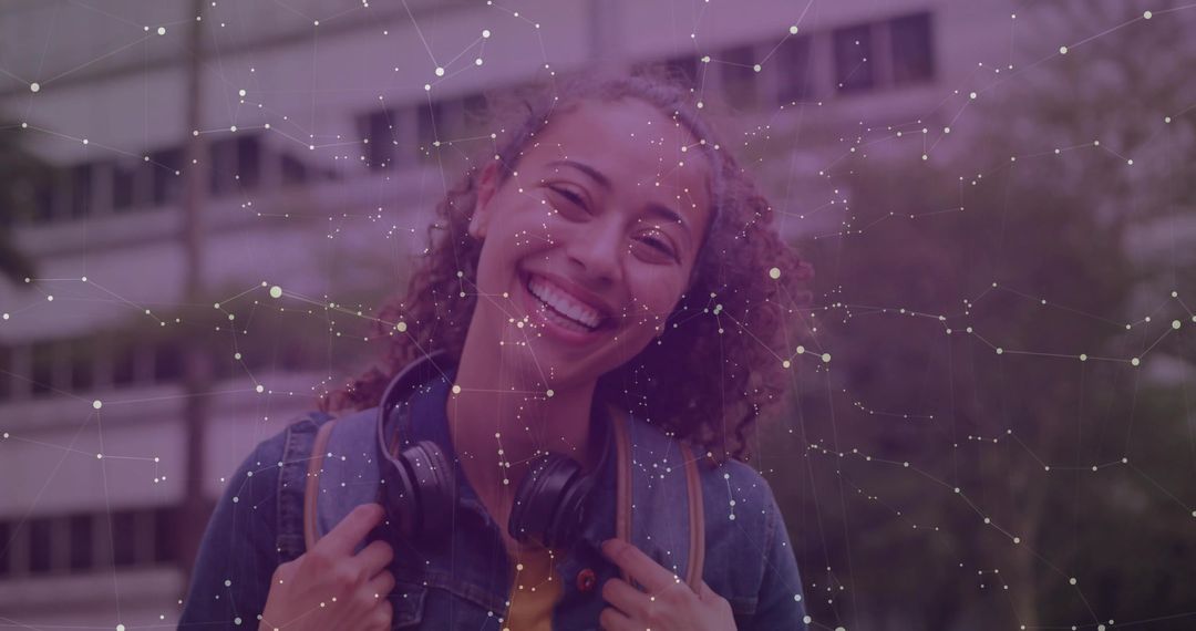 Smiling Student with Headphones in Urban Technological Network
